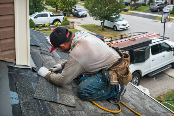 Professional Roofing technician working in Knoxville, IL